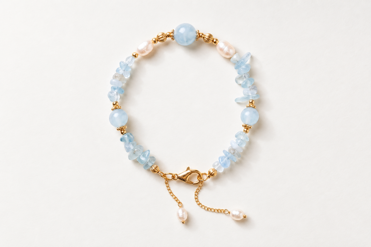 AI-assisted editorial illustration of the Tide Chime aquamarine-and-pearl bracelet; a catalog example, not an amazonite specimen or authentication result.