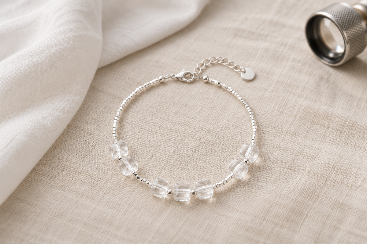 Is an emerald crystal bracelet real emerald, and what should it cost?