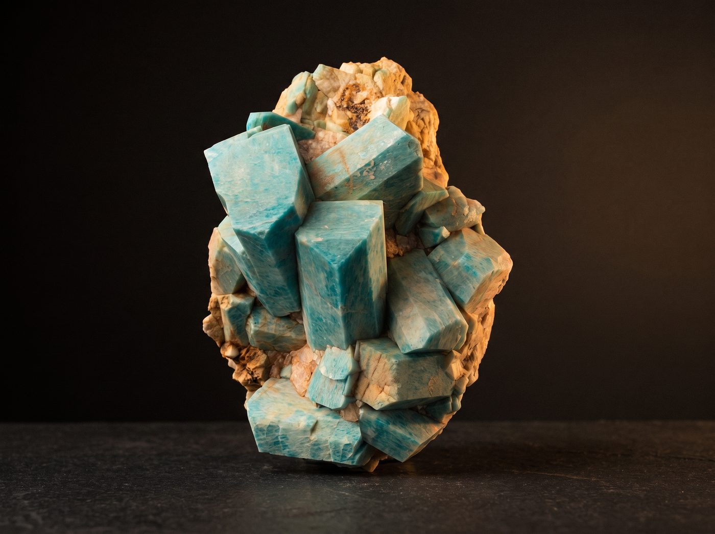 Amazonite rough specimen on dark stone