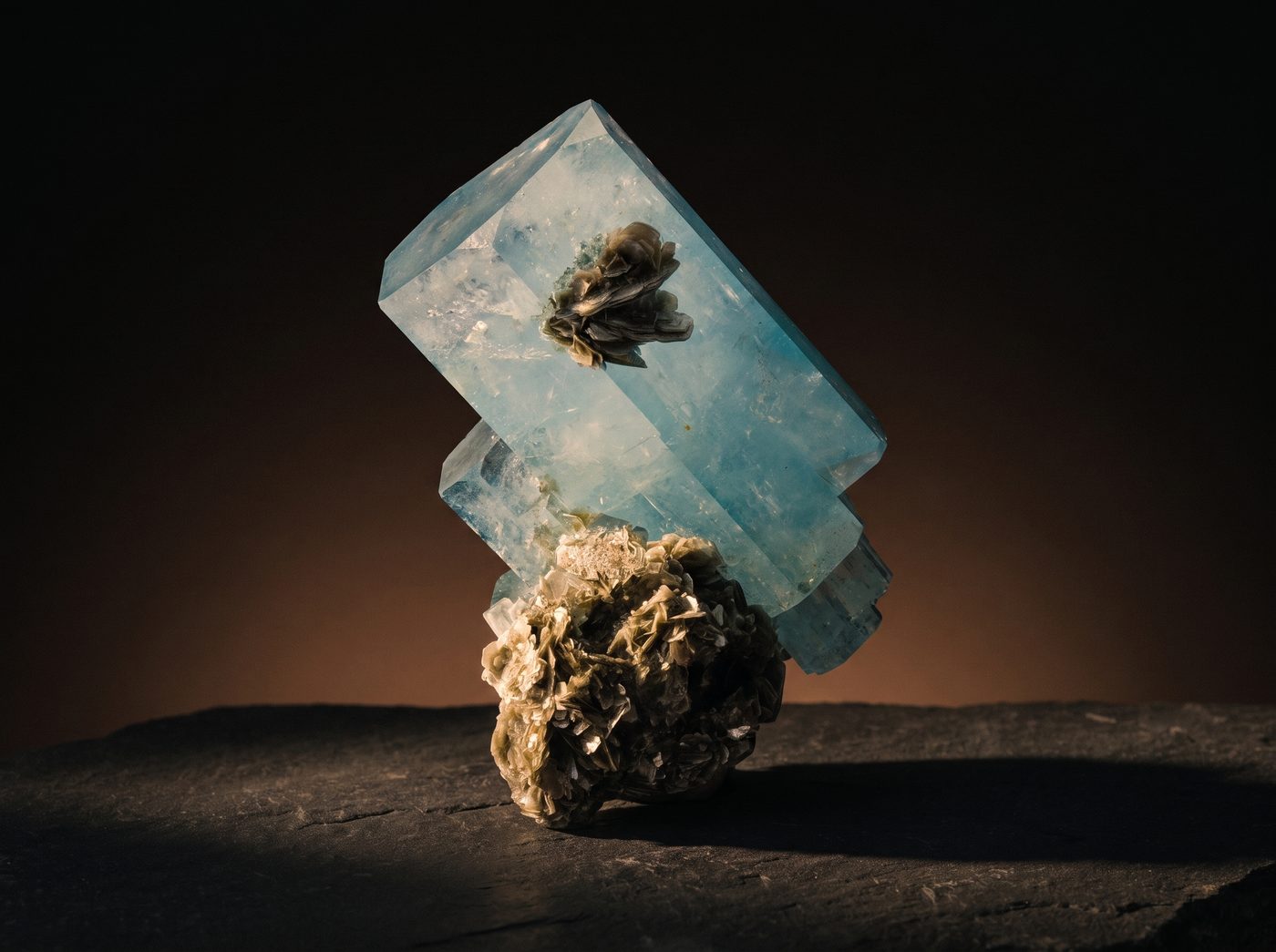 Aquamarine on dark stone