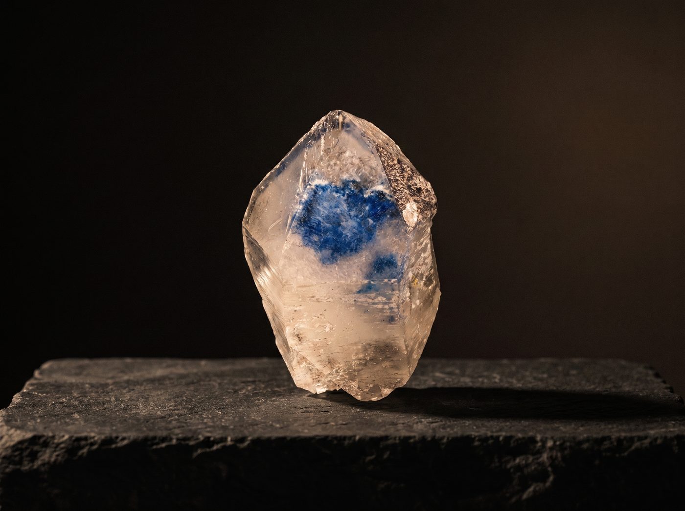 Blue Quartz rough specimen on dark stone