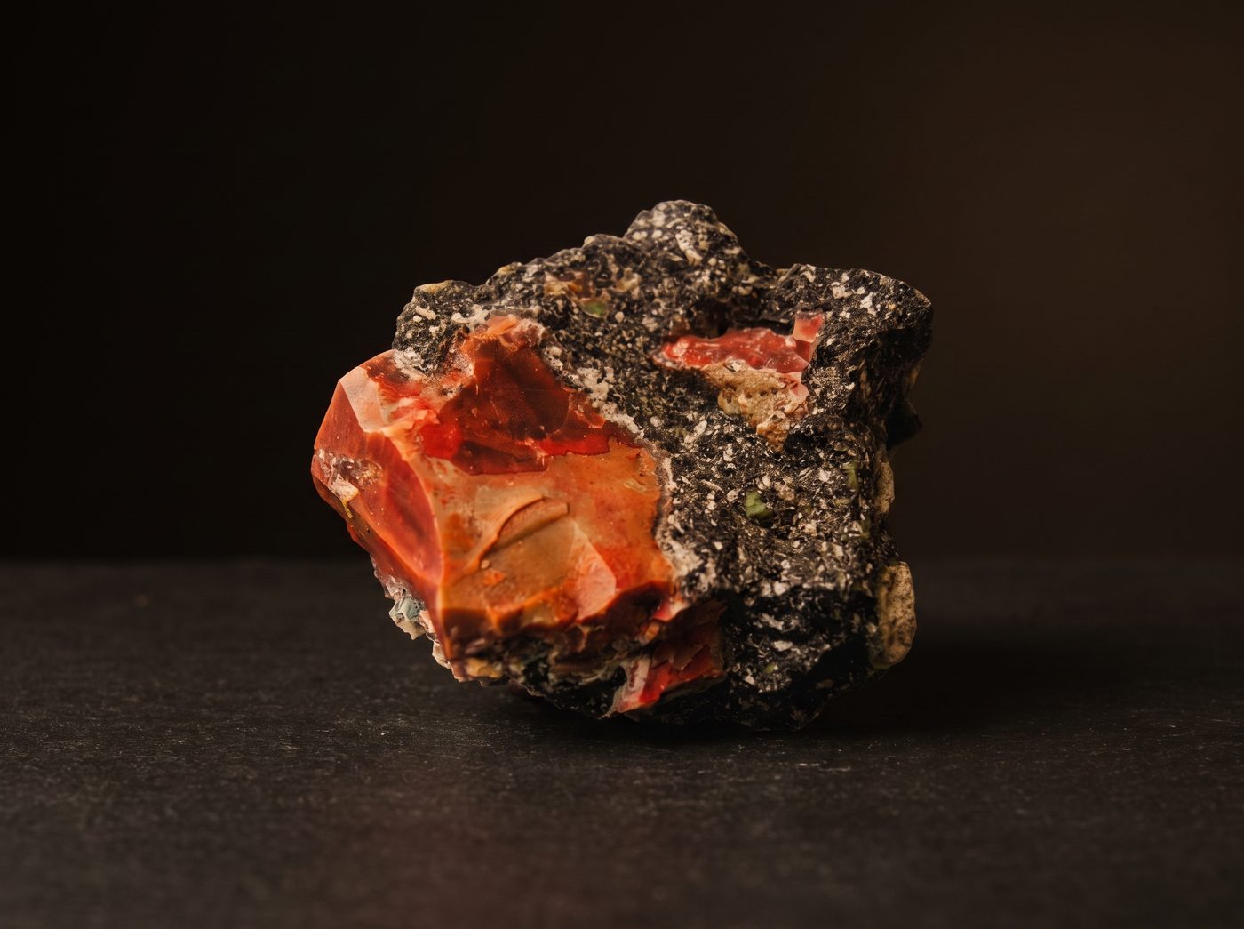 Carnelian rough specimen on dark stone