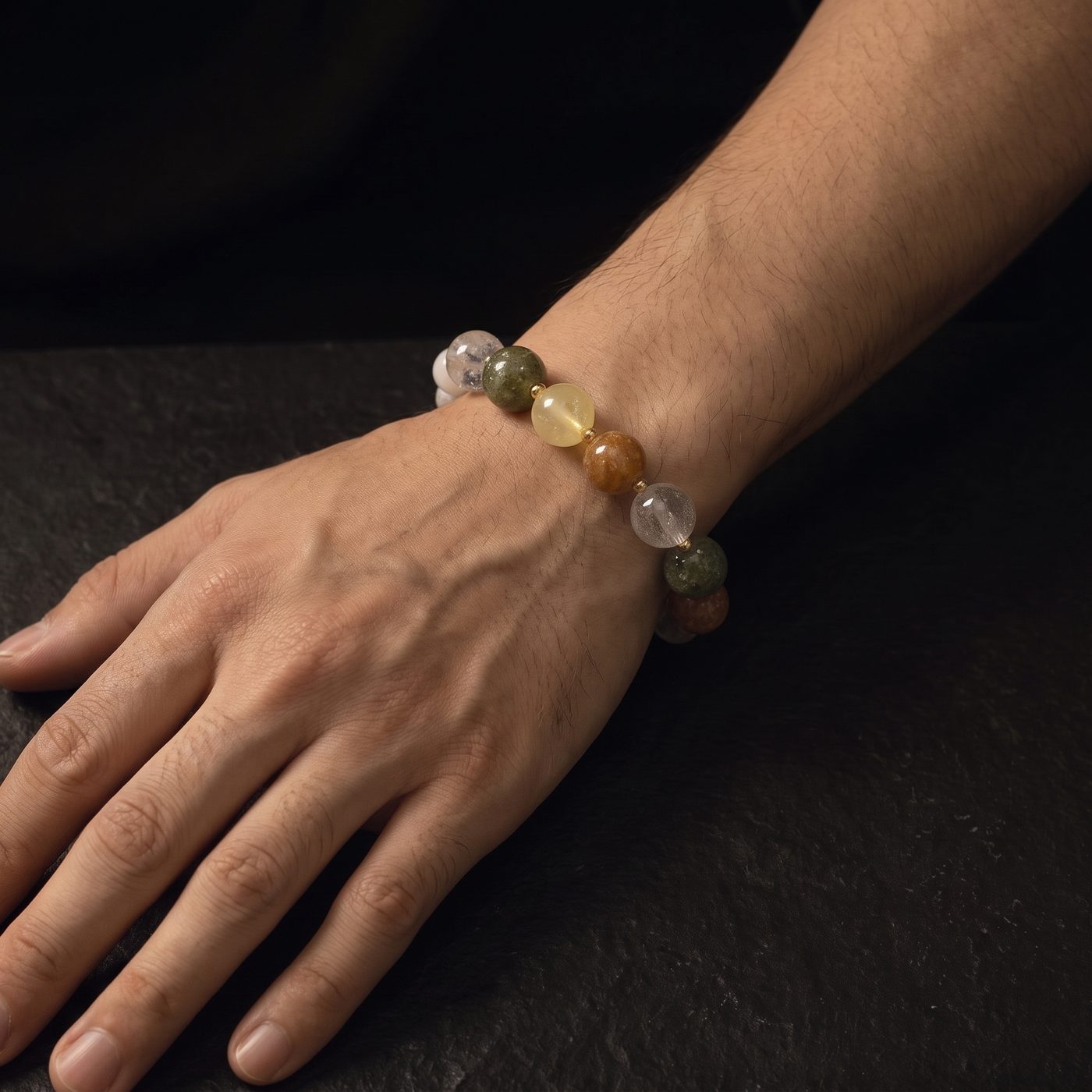 The same bracelet worn on a broader wrist